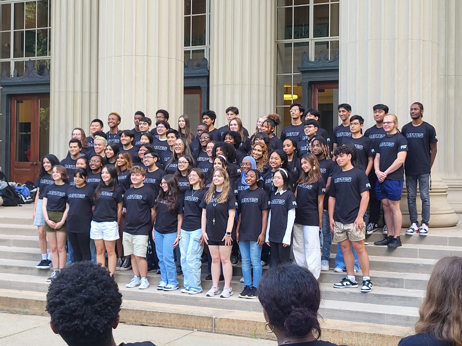 Ava with the MITES cohort on the steps at MIT