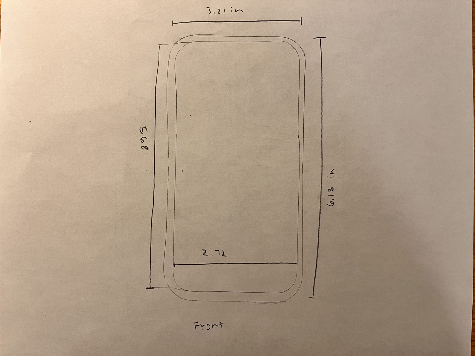 Hand-drawn dimension sketch of the phone's front outline, used to size the cradle.