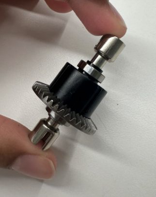 The assembled gear differential — bevel gears and shafts that split drive to the rear wheels.